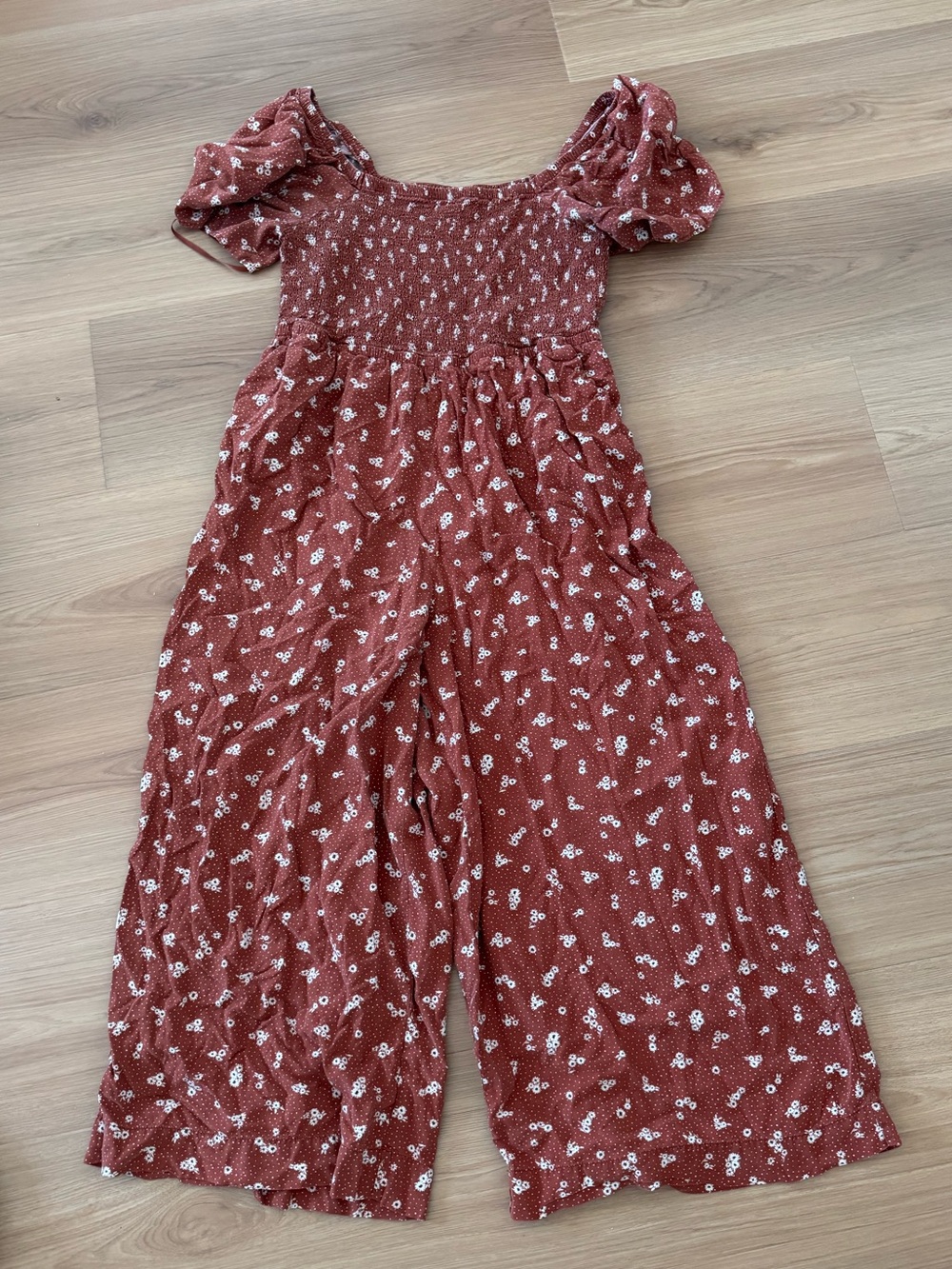 Torrid red/orange jumpsuit with white floral print